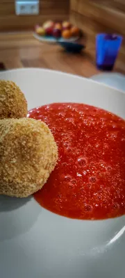 Topfenknödel mit Erdbeersoße