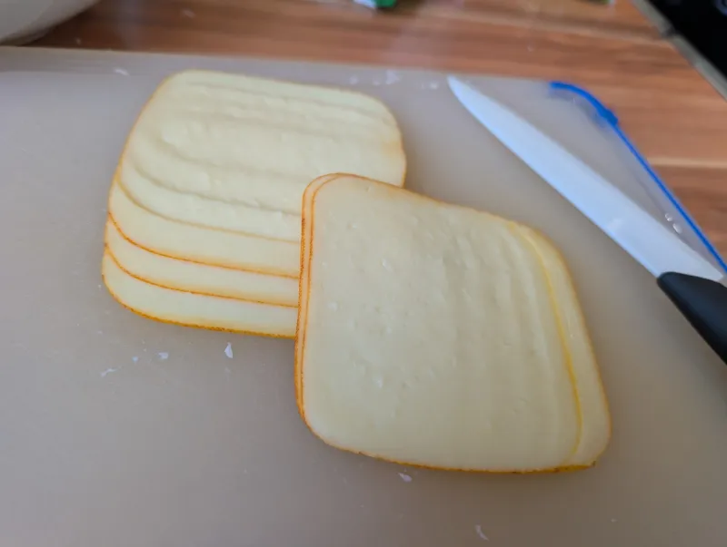 Arbeitsschritt 3: Bergkäse Hörnchen-Pfanne mit Schinken