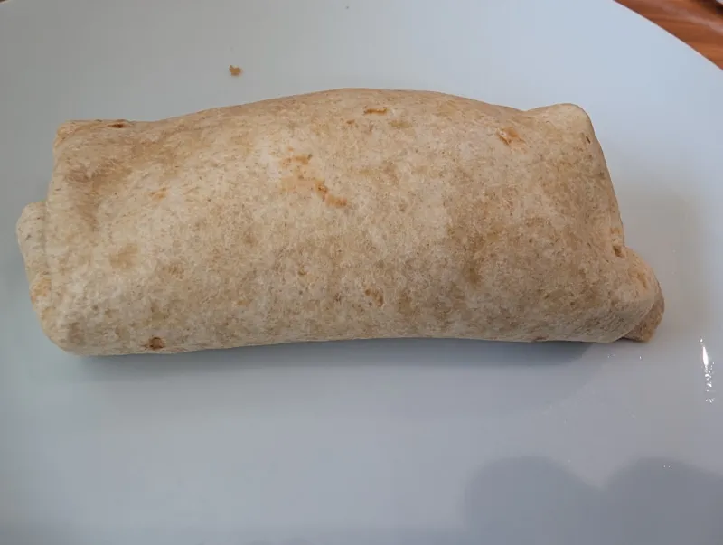 Arbeitsschritt 10: Salsiccia Weißkraut Protein Wraps mit Klebreis
